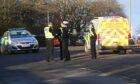 Police at the scene of the crash at the junction between Oscar Road and Grampian Place in Torry. Image: Chris Sumner/DC Thomson.