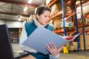 warehouse manager checks double duty charges on imports in the UK