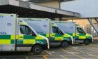 Ambulances have been queuing up outside heath care facilities across Grampian, including Aberdeen Royal Infirmary and Dr Gray's Hospital in Elgin. Image: Kenny Elrick/ DC Thomson