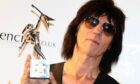 Jeff Beck, who has died aged 78, picking up one of his many awards.