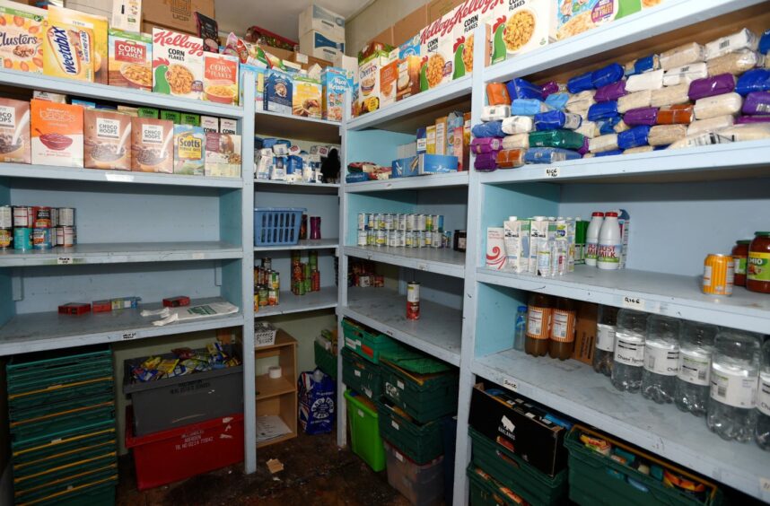 Instant Neighbour - and other Aberdeen foodbanks - are feeling the strain as more and more people are encouraged to seek their help. Image of the St Machar Drive stockroom in 2019. Image: Darrell Benns/DC Thomson.