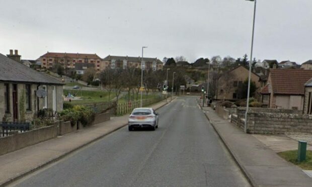 Police are on the scene of a two-vehicle crash on Elgin road just outside Lossiemouth. Image supplied by Google Maps