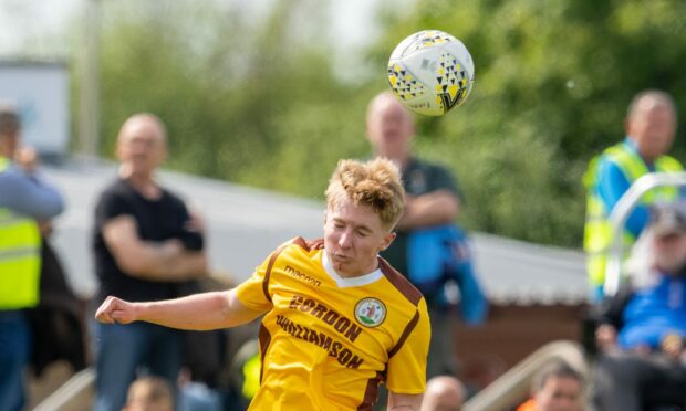 Joe Gauld, in action for Forres Mechanics, has signed for Huntly