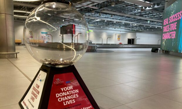 Aberdeen International Airport passengers have donated more than £3,000 to the charity globes. Image: Aberdeen International Airport