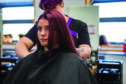 A student hairdresser at North East Scotland College.