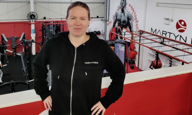Fitness instructor Eija Puustinen in the Aberdeen gym where she teaches women weight training classes.