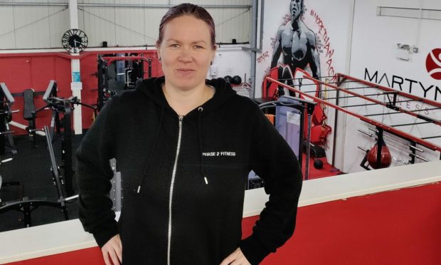 Fitness instructor Eija Puustinen in the Aberdeen gym where she teaches women weight training classes.