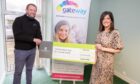Barratt donating £10,000 to Highland Homeless Trust in March 2022. Image: Barratt Developments.