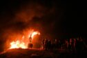 Burning of the Clavie in Burghead makes a comeback to its original date with a huge flock of people turning up for the ancient New Year event. Picture by Jason Hedges / DC Thomson