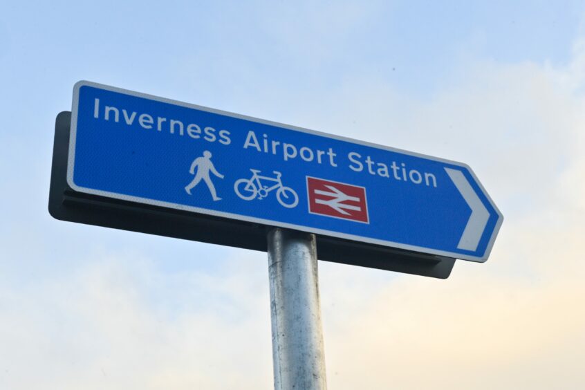 An Inverness Airport Station foot and cycle path sign. 