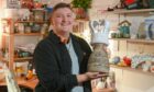 A year on... Aberdeen potter AJ Simpson with their winner's trophy from The Great Pottery Throw Down. Image: Kenny Elrick/DC Thomson.