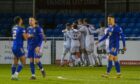 Ayr United players congratulate goalscorer Nick McAllister against Cove Rangers. Image: Kenny Elrick/DC Thomson