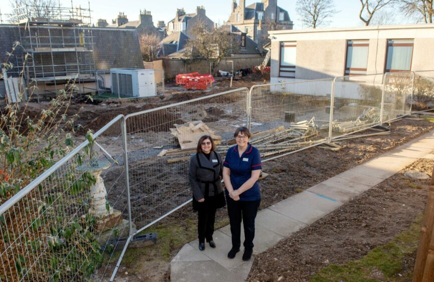 Bets Welman and director of clinical services Karen Benton on the site of the Albyn Hospital expansion with construction now underway.