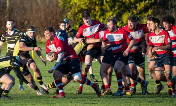 Aberdeen Grammar's Mark Galloway on the charge against Melrose. 
Image: Kami Thomson/DC Thomson