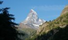 The majestic Matterhorn bathed in morning sunshine.