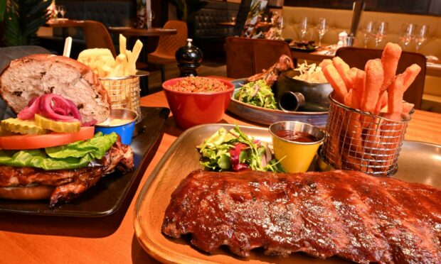 From left: Gidi Grill chicken burger, Gidi Grill spiced mac and cheese and slow sizzling sticky smoked pork ribs. Image: Paul Glendell/DC Thomson