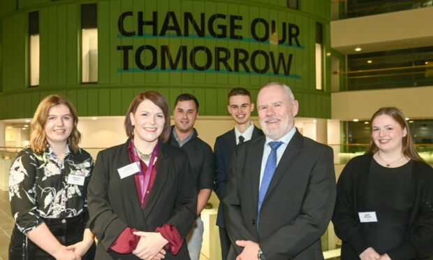 RGU has launched Scotland's first Climate Clinic. Pictured in the back row - Rebecca Petrie, Steven McIntyre, Calum Graham and Eilidh Stewart. Front row - Hannah Moneagle and Steve Oliver, RGU Principle. Image: Paul Glendell / DC Thomson