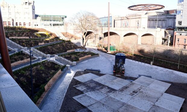 Boards have been laid on the mud in Union Terrace Gardens for the next few weeks. Image: Darrell Benns/DC Thomson.