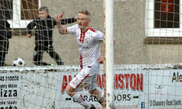 Marc Scott, left, celebrates scoring his and Brechin City's second goal against Lossiemouth