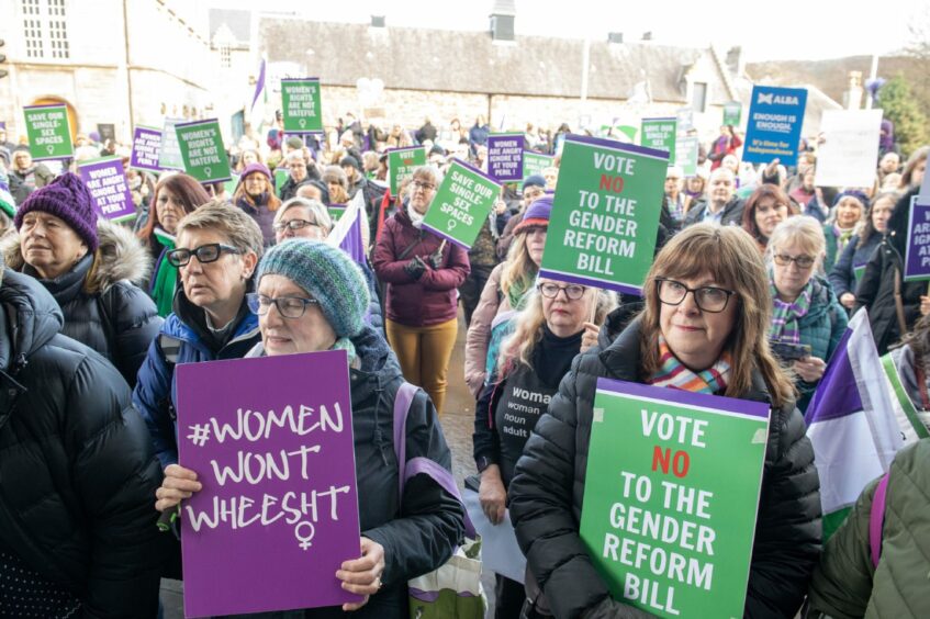 Supporters of the For Women Scotland and the Scottish Feminist Network holding signs that read, 'Vote No to the Gender Reform Bill', in a demonstration outside the Scottish Parliament in Edinburgh, ahead of the vote on the Gender Recognition Reform (Scotland) Bill. 