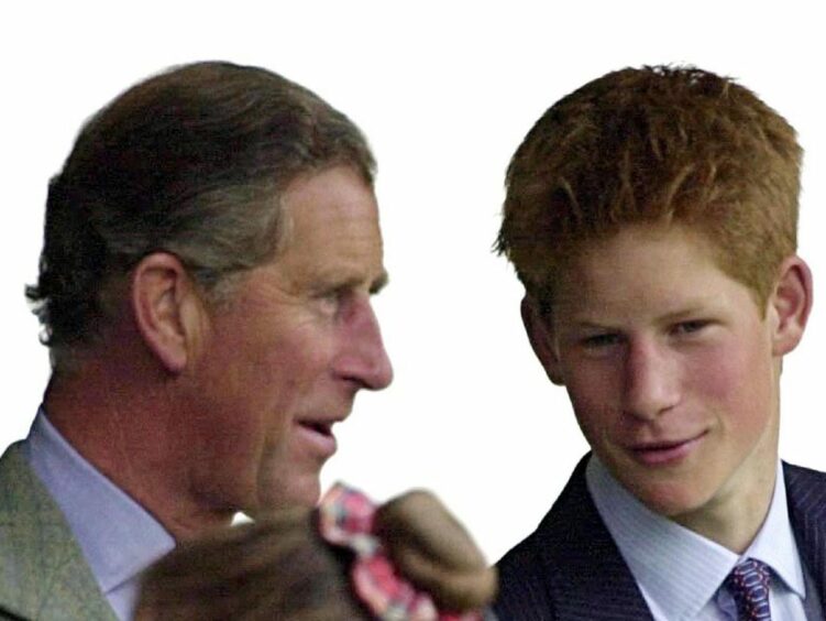 Prince Harry pictured with his father as a teenager, around the age he would have been when the dead deer incident would have taken place.