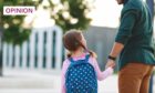 The walk to and from school can be a good time for a chat between parents and their children (Image: Evgeny Atamanenko/Shutterstock)
