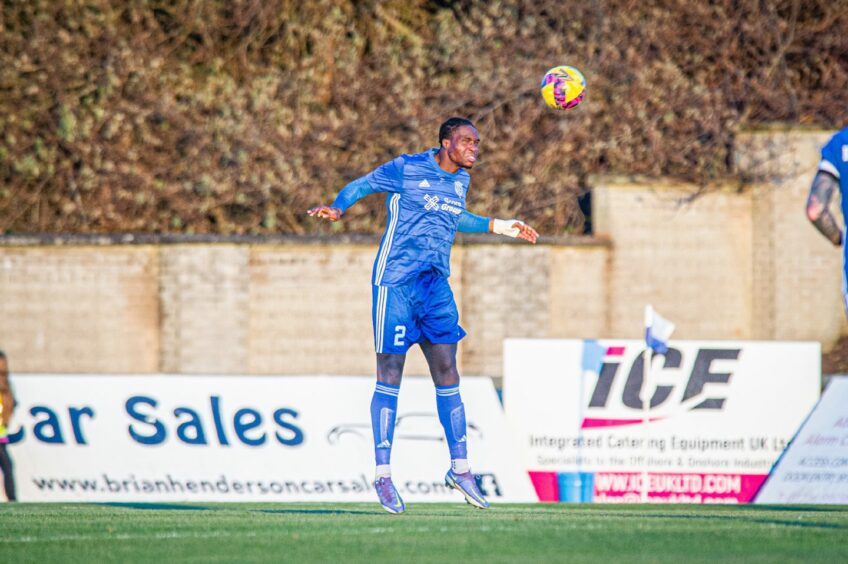 Kevin Joshua heads clear against Montrose. Image: Wullie Marr/DC Thomson