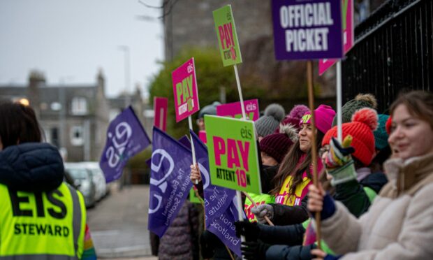 Teachers have formed picket lines at schools across Scotland. Pictured is striking staff outside Sken Square Primary School in Aberdeen. Image: Wullie Marr/DC Thomson.