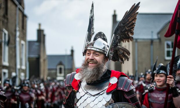 A squad of Viking paraded through the streets of Lerwick on Tuesday morning led by Guizer Jarl Neil Moncrieff. Image: Wullie Marr/DC Thomson