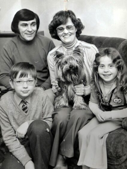 Ernest Gove with his wife Christine, son Michael, daughter Angela and their dog Sparky.