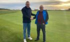 Royal Dornoch's former captain Willie MacKay (right) welcomes James Skelton, captain of the Oxford and Cambridge Golfing Society which is taking the historic clash to the Highlands for the first time.