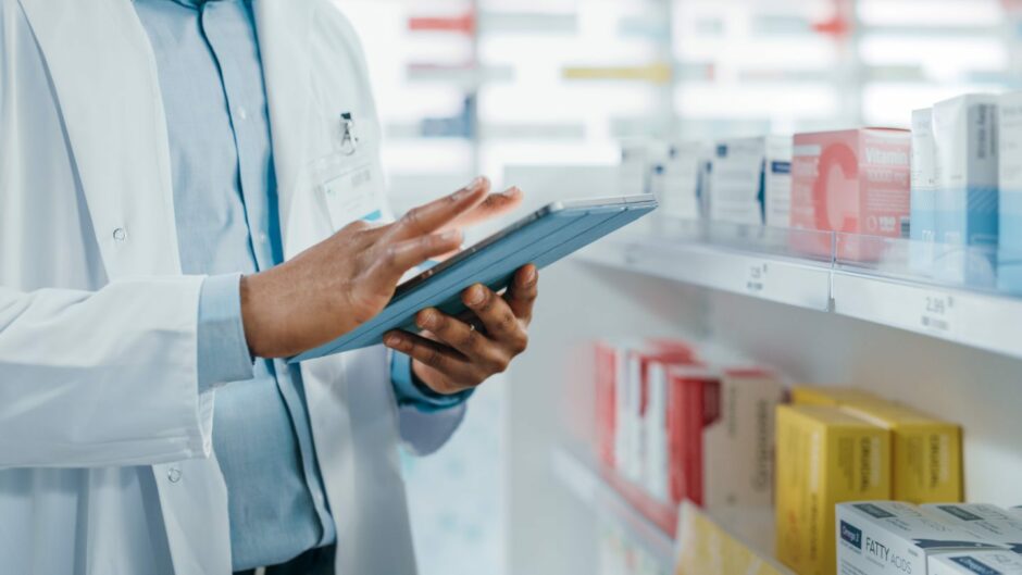 Pharmacist with tablet
