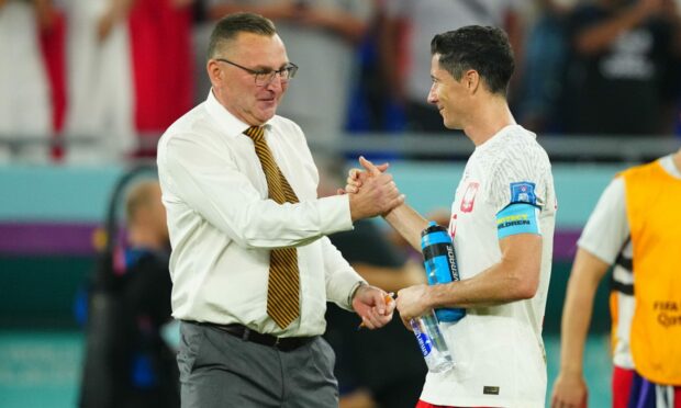 Manager Czeslaw Michniewicz of Poland with Robert Lewandowski at the World Cup. Image: Shutterstock