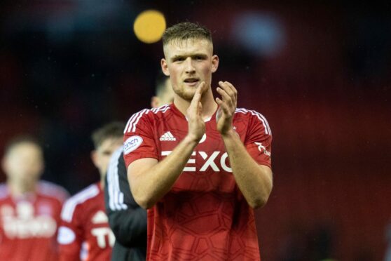 Aberdeen defender Mattie Pollock applauds the fans after the 3-1 win against Motherwell. Image: Shutterstock