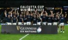 Scotland celebrate their third successive Calcutta Cup win.