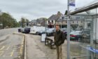 Andrew Bowie MP at a bus stop in Aboyne, one of many Deeside and Donside communities he has argued isn't served well enough by public transport. Image: Andrew Bowie