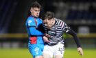 Defender Jake Davidson, right, in action for Queen's Park against Inverness midfielder Aaron Doran last season, is highly rated by his former manager Owen Coyle. Image: SNS Group