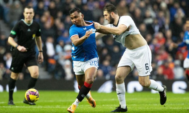 Rangers striker Alfredo Morelos and Ross County defender Alex Iacovitti in action. Image: Alan Harvey/SNS Group