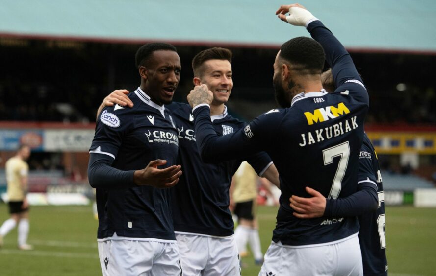Alex Jakubiak celebrates his goal against Cove Rangers with Zach Robinson and Cammy Kerr. Image: SNS
