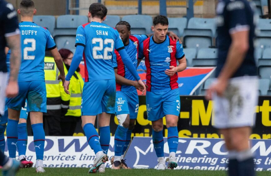 Cameron Harper is congratulated after getting Caley Thistle level against Dundee. Image: SNS