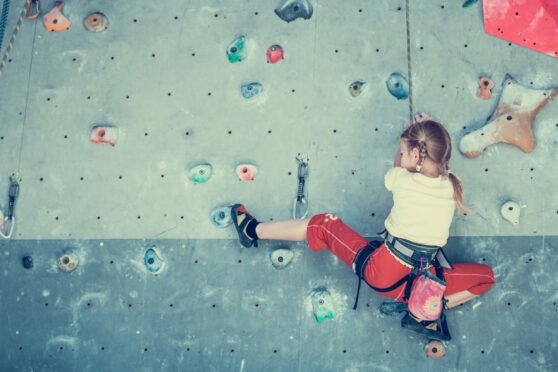 Families and children regularly use the climbing wall at Inverness Leisure Centre. Image: Shutterstock.