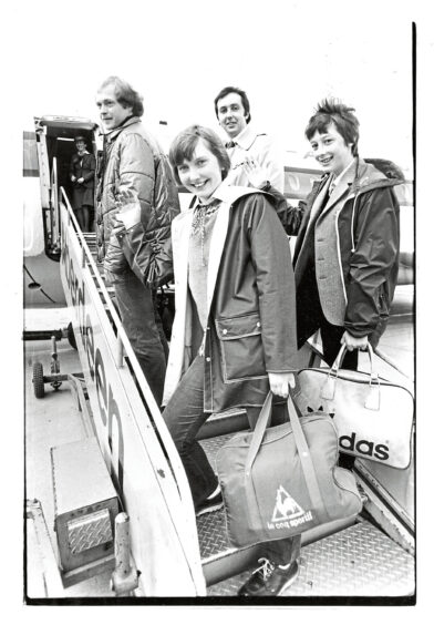 1981 - Smiles from the winners of The Press and Journal/Aberdeen University debating contest, Dawn Philip and Murdo Macleod, as they board a Dan Air flight for their prize trip to London.