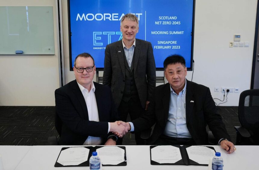 ETZ offshore renewables director Andy Rodden, Scottish trade minister Ivan McKee and Mooreast CEO Sim Koon Lam