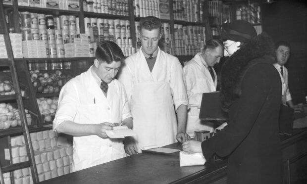 Sugar, bacon and butter ration being bought in wartime Aberdeen. Image: DC Thomson