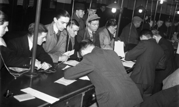 1940 - Pictured is the National Registration 23s register at Aberdeen Ministry of Labour in February 1940, following the National Registration Act the previous year.