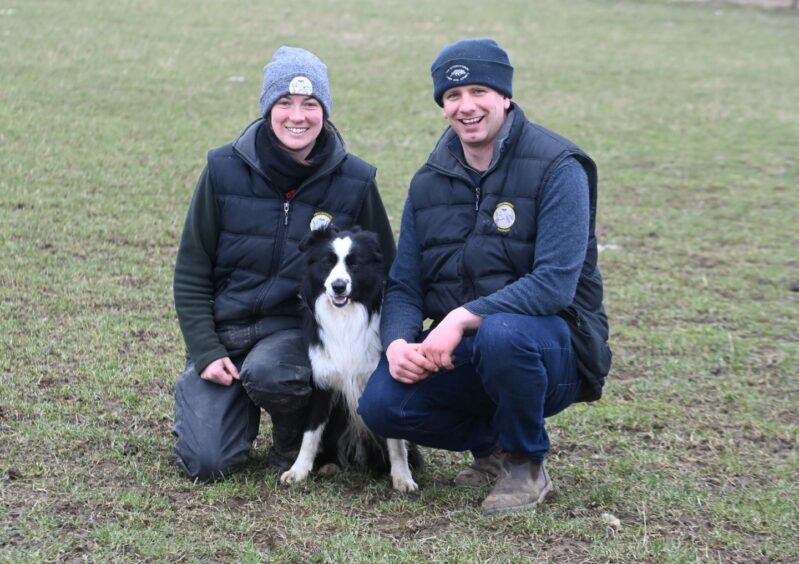 Michelle &amp; Gary Bruce with their dog Teeick in between them 