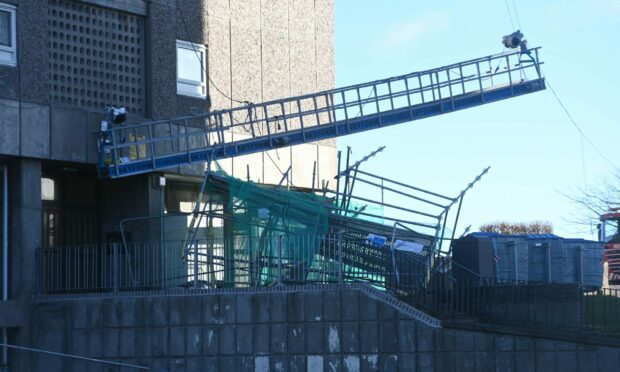 The scaffolding at Elphinstone Court in Tilldyone was destroyed in the storm. Image: Chris Sumner/ DC Thomson.