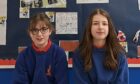 Crown Primary School pupils Pippa Muir and Anna MacFarlane share what they have learned about poverty. Image: Crown Primary School