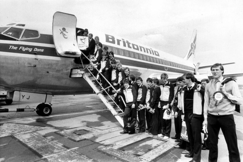 The Dons squad board the plane for the trip to Gothenburg. Image: Aberdeen Journals