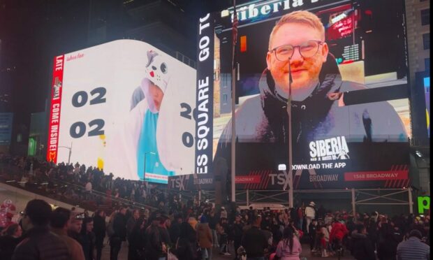 The video was played on a billboard in Times Square, New York. Image: Scott Anderson.